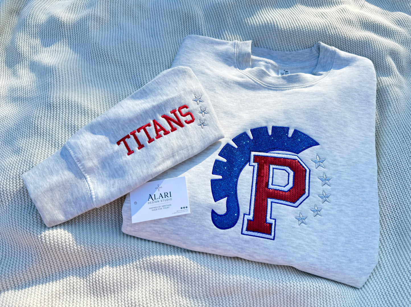 Embroidered Pembroke Titans sequin sweatshirt